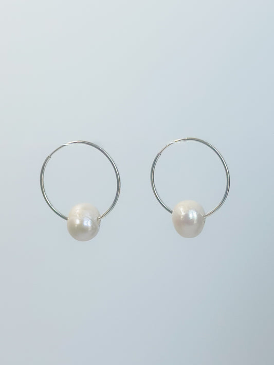 Sterling silver endless hoop pearl earrings